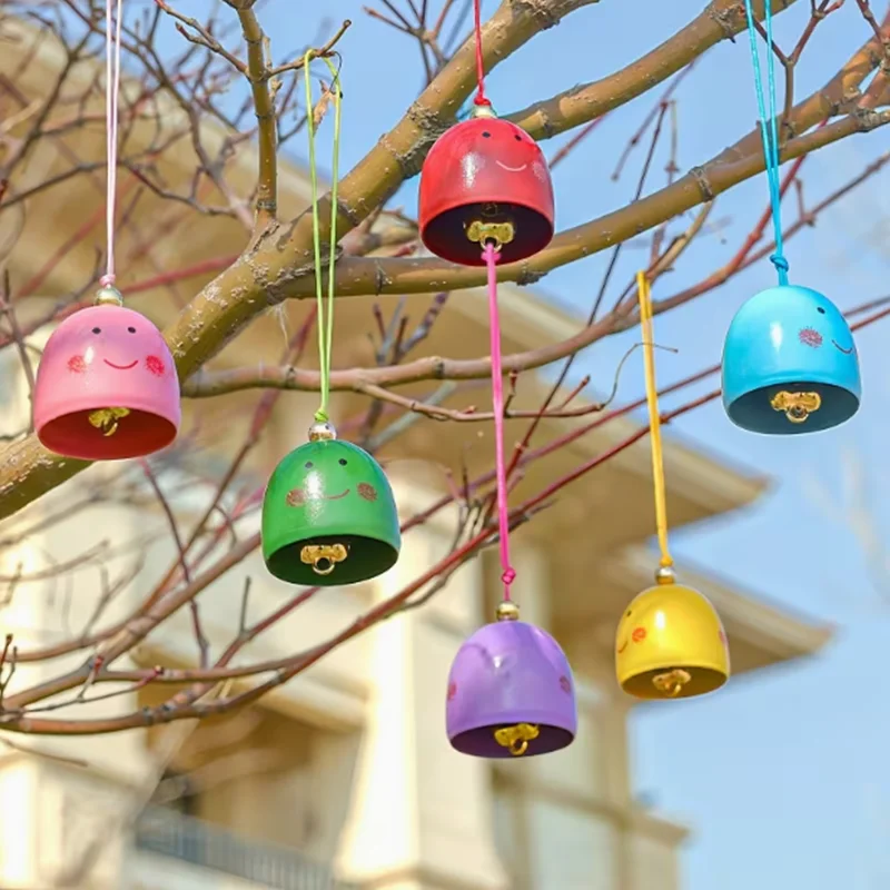 Random 3pcs The smiling wind chime comes with a hanging cord and a bell. It is a decorative bell pendant for festive occasions
