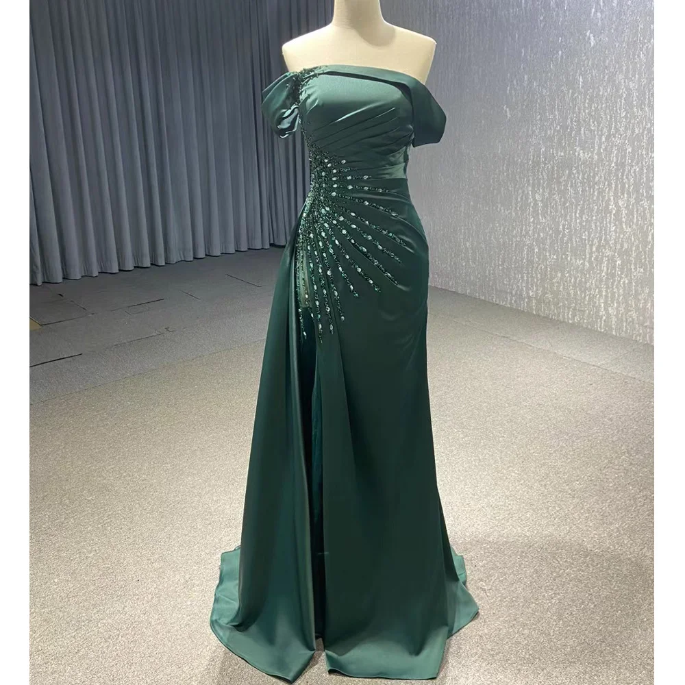 Abito da sera verde senza spalline con maniche lunghe, allacciatura sul retro, cristalli, drappeggiato, personalizzabile 2026