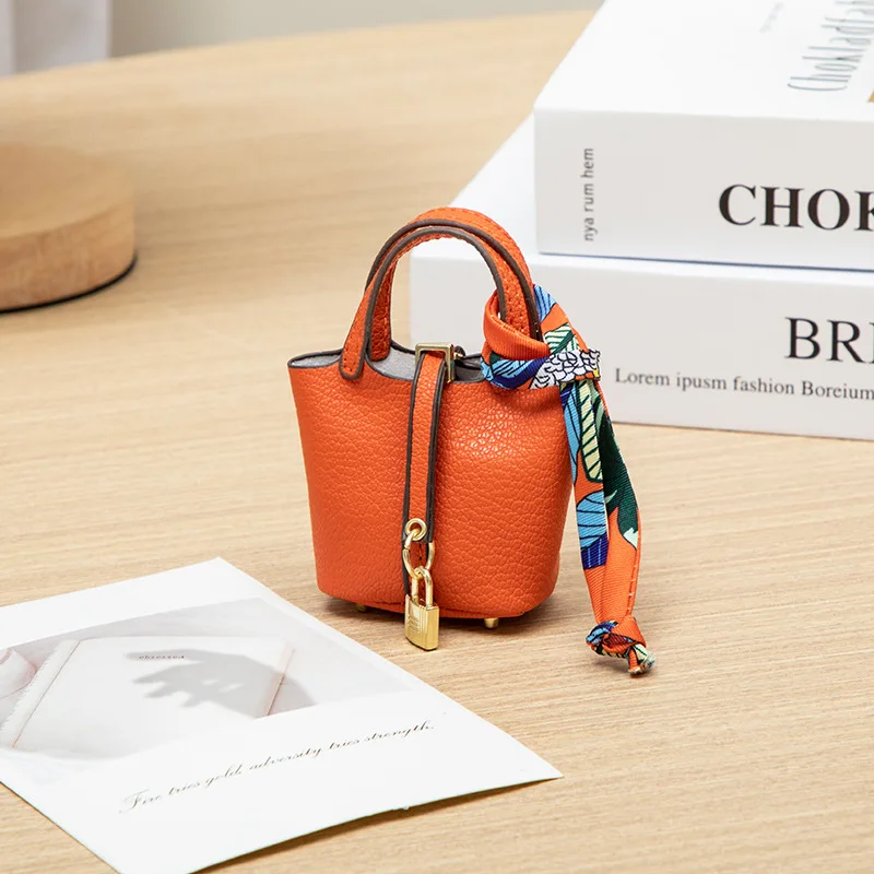 2026 Mini-Taschenanhänger Schlüsselanhänger Hängeaccessoire Zero Wallet Kreatives tragbares Armband Bluetooth-Kopfhörertasche Multifunktional – Detail 12