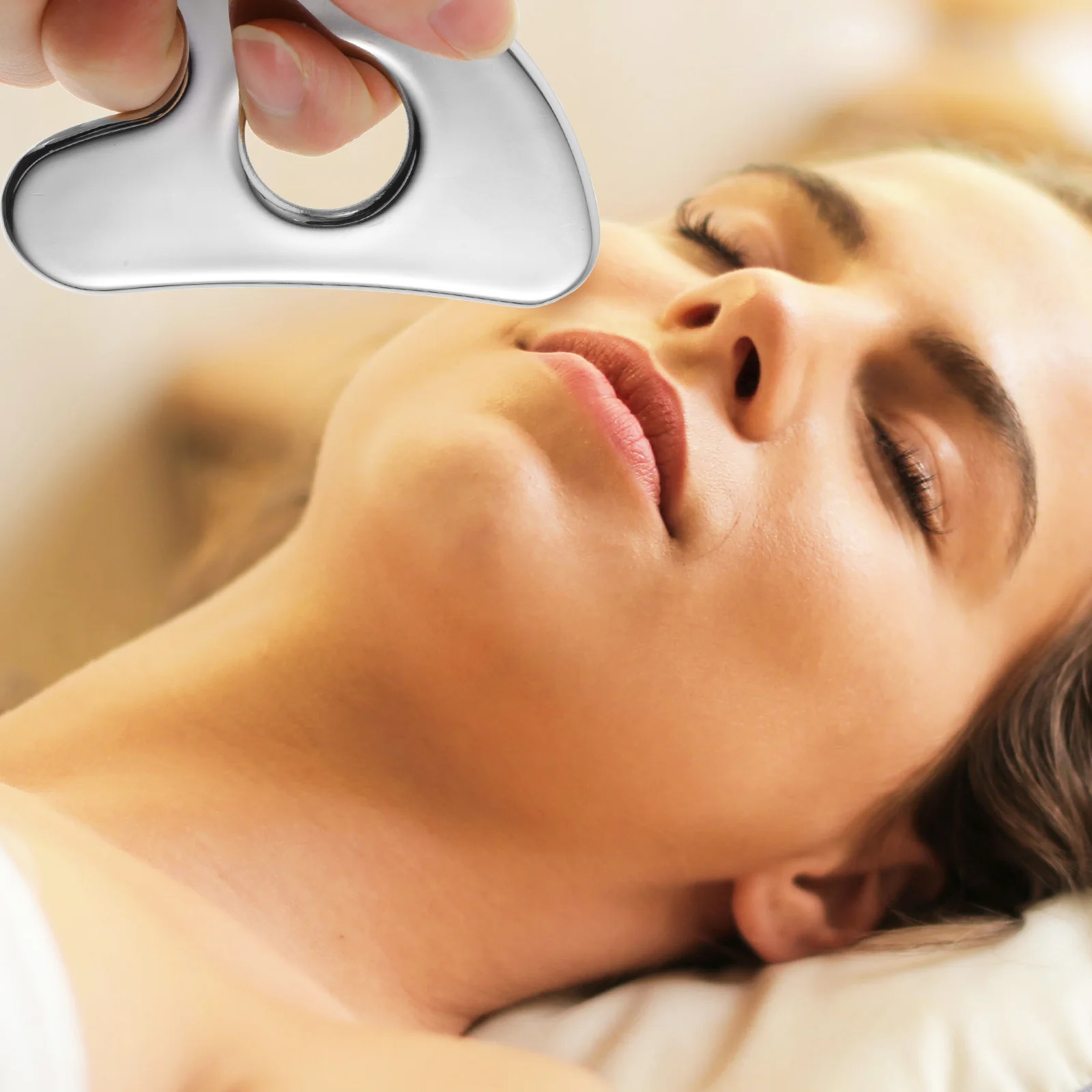 เครื่องขูดหน้าสแตนเลสแบบเรียบ ดีไซน์กะทัดรัดสำหรับใช้ในบ้าน ส่งเสริมการไหลเวียนโลหิตและการผ่อนคลาย เครื่องมือนวดกัวซา