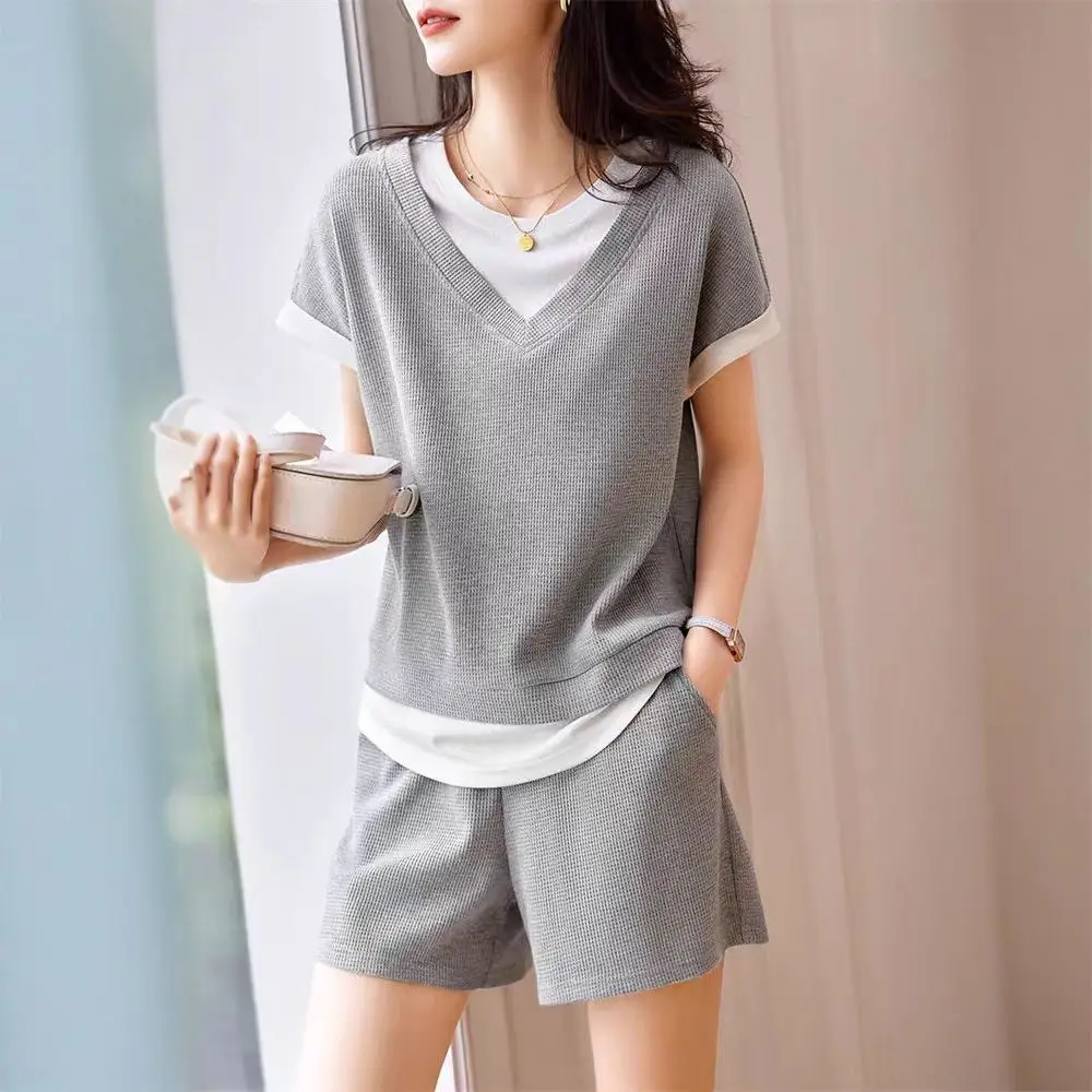 

Стильные женские короткие комплекты из двух предметов, спортивный костюм для бега, шикарные и элегантные повседневные роскошные женские шорты из двух предметов на заказ