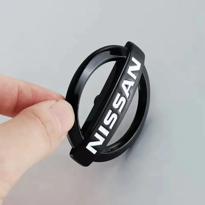 52 مللي متر 56 مللي متر غطاء عجلة توجيه سيارة ملصق شعار شعار لنيسان X-trail قاشقاي ملاحظة جوك سنترا باترول نافارا ميكرا