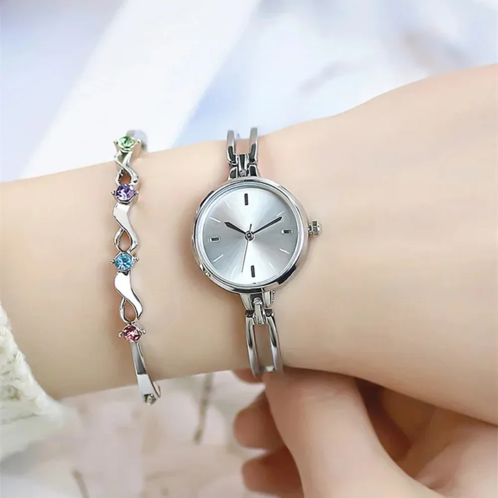 Reloj de pulsera de plata de 25mm para Mujer, pulsera de cuarzo de aleación de lujo, regalo para niña, Reloj de oro rosa para Mujer