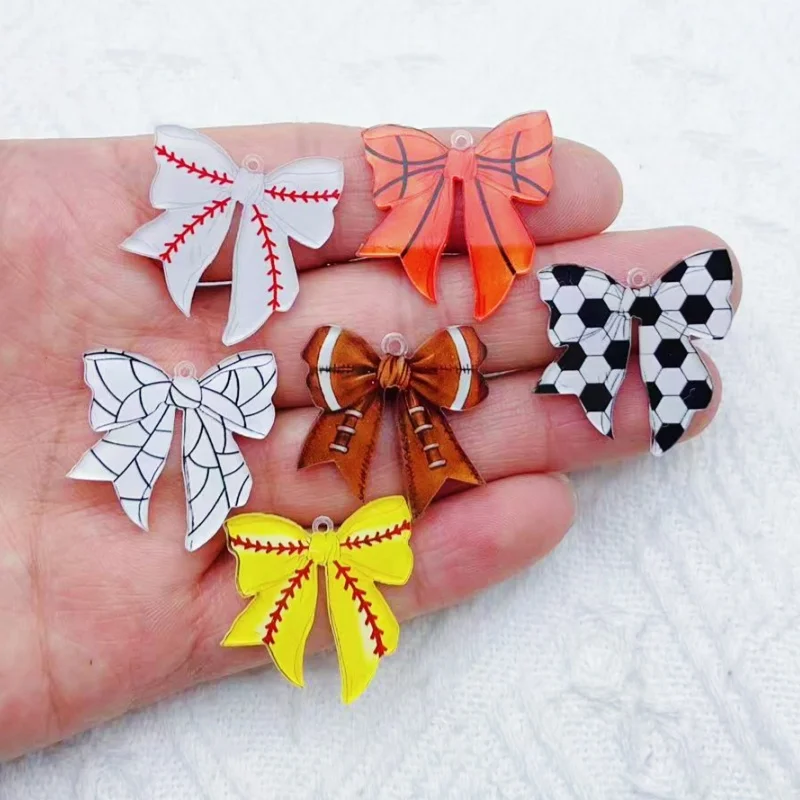 10 pieces of acrylic football rugby element bow pendant earrings necklace keychain DIY production process