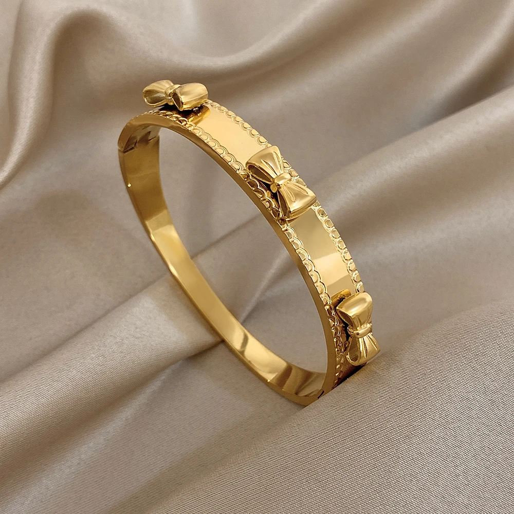 

DODOHAO Sweet Cute Bowknot Stainless Steel Bangle Bracelet Women Creative Gold Color Round Cuff Spring Bangle Waterproof Jewelry