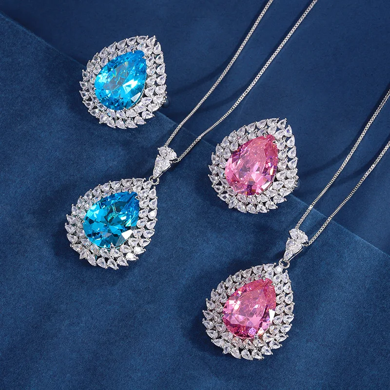 

New European and American fashion pink and blue tapered silver-edged ring and pendant set