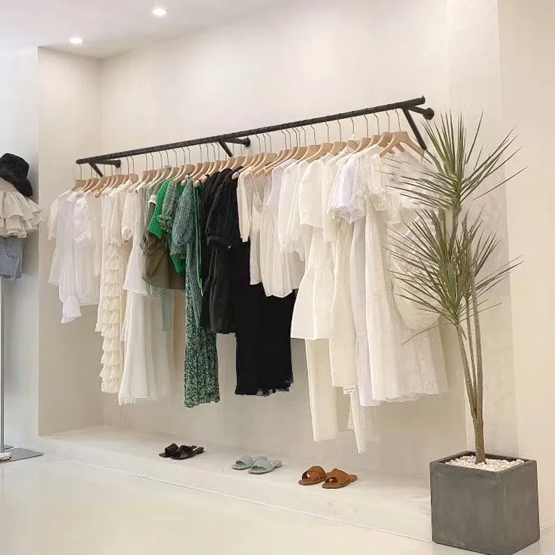 black-wall-mounted-display-rack-for-clothing-stores-men's-and-women's-wear-children's-wear-shops-hanging-clothes-rack