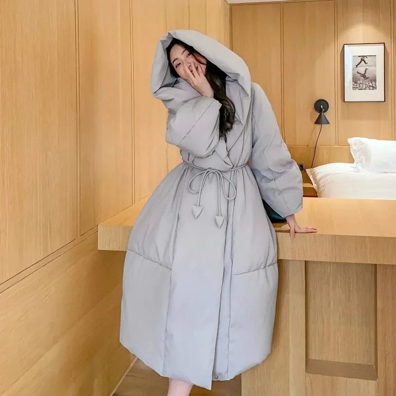 Invierno nuevo abrigo de plumón de pato blanco para mujer hasta la rodilla moda suelta con cordones capucha a prueba de viento Parkas cálidas abrigo de mujer