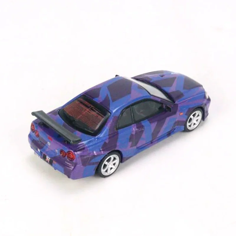 MINI GT 1:64 Nissan Skyline GT-R (R34) V-Spec II Digital Camouflage Purple  5 Years Anniversary Model RHD MGT00446-R racing car