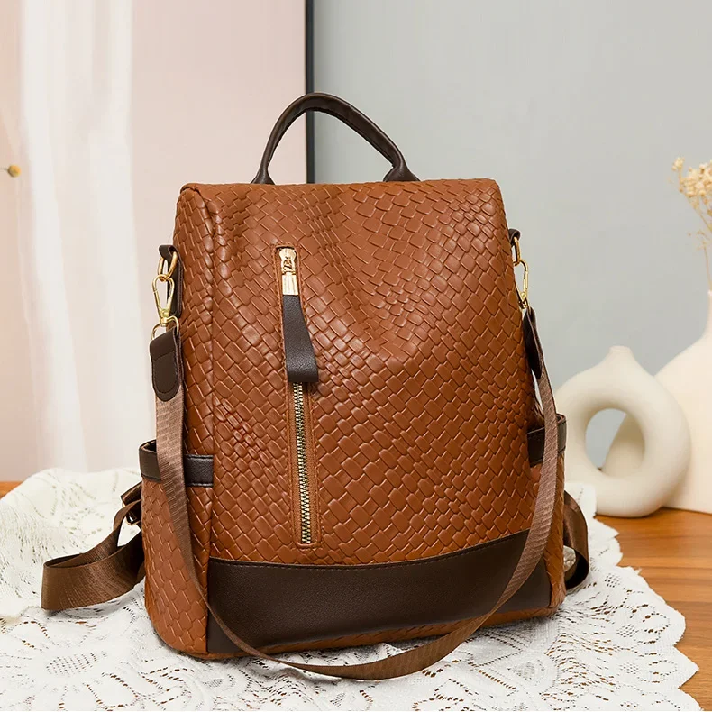 

New Women's Anti-Theft Backpack For Spring Large Capacity Soft Leather Travel Backpack Woven Pattern Street Trend Shoulder Bag