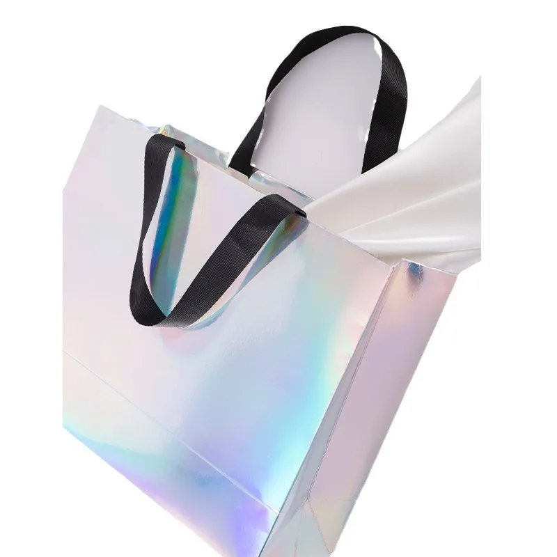 It is customized. Colorful handbag cloth bag customized clothes bag high-end solid customized paper packaging bags