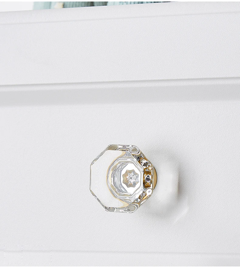 Clear faceted glass drawer knob with brass mount