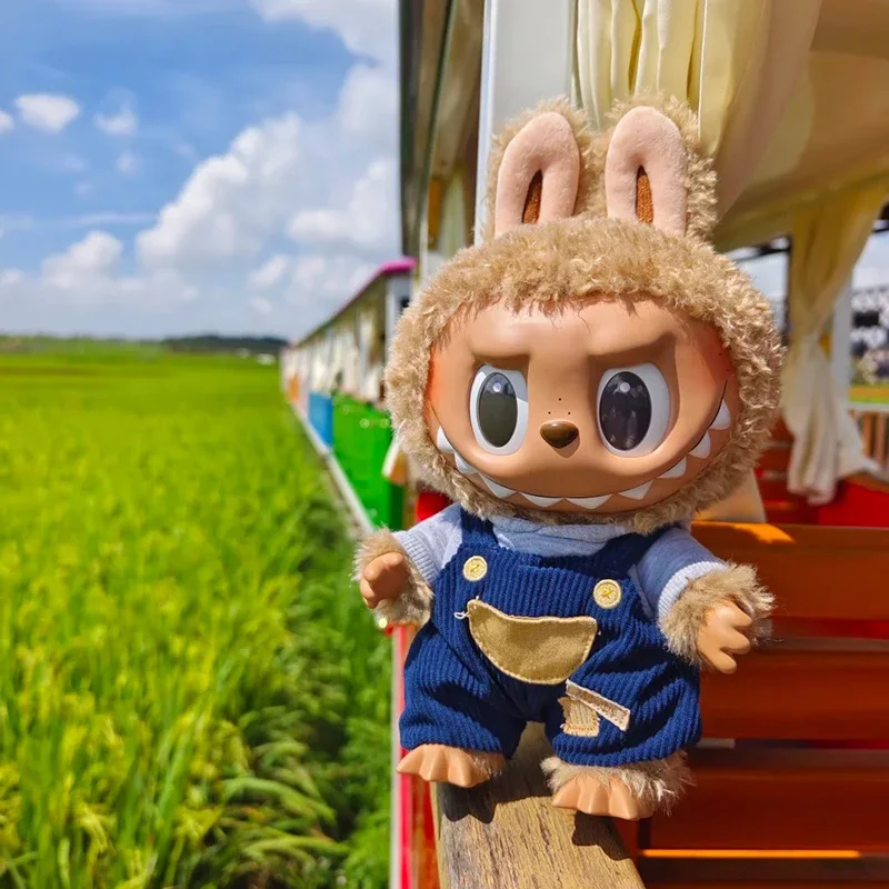 

Ограниченная серия LABUBU's Gen1 Lazy Holiday для Lazy Day представляет собой двухформированный дизайн с черной веснушками из кожи, модный коллекционный дизайн.