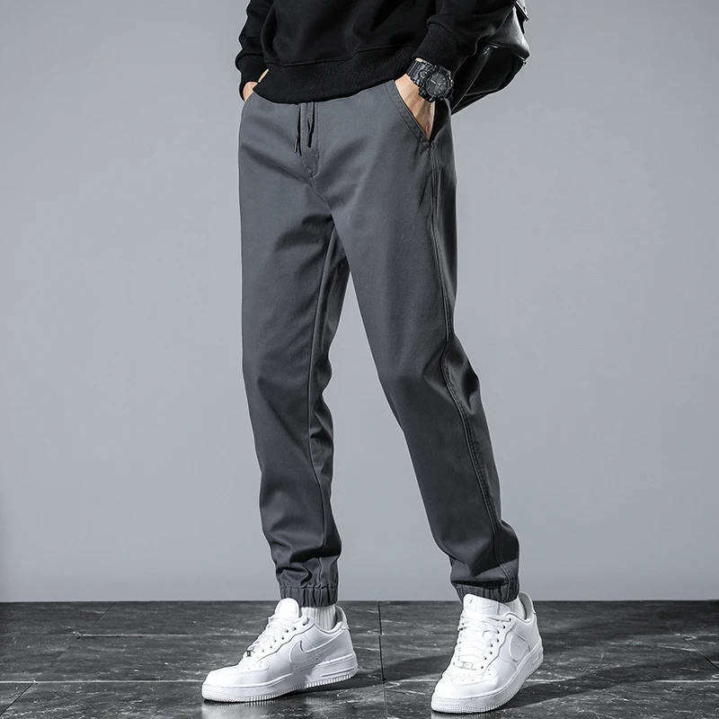 The tide of fall and winter padded and thickened elastic waist head men's straight pants casual drawstring pants men's models