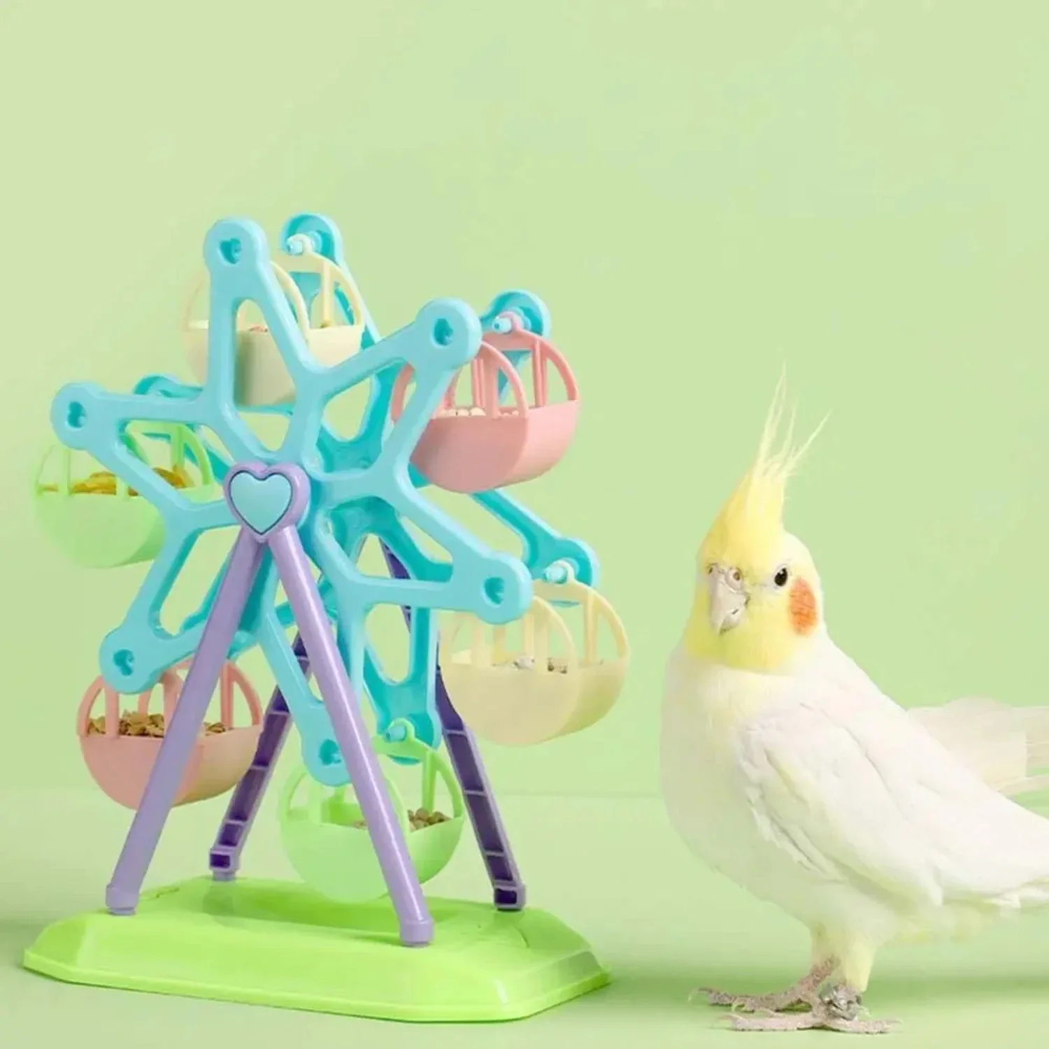 

Exciting and vibrant multi-colored Ferris wheel toy for lovebirds and cockatoos. This interactive windmill design features a rot