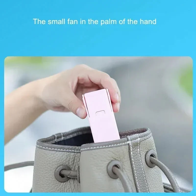 Nuovo piccolo ventilatore portatile portatile creativo mini tre velocità regolabile colore solido ricarica ventola piegata supporto per telefono illuminazione a LED