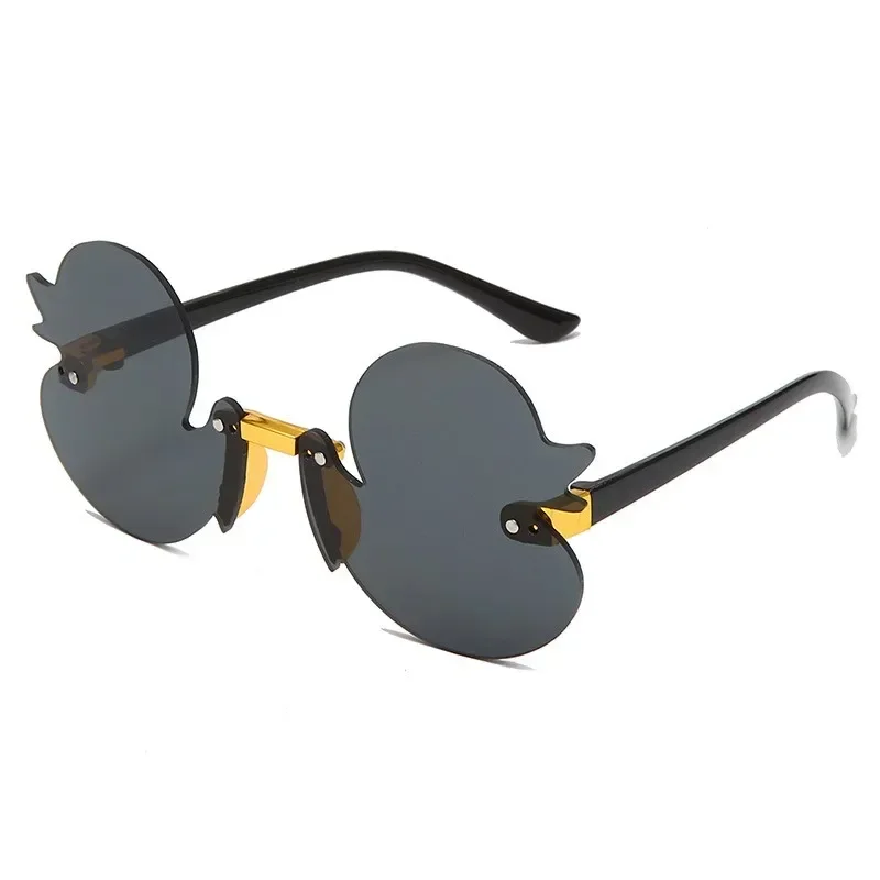 

Fashion Children's Sunglass Rimless Cartoon Duck Shape Sunshade Anti-Ultraviolet Glasses Party Decorative Glasses for Kids Очки