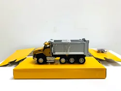 DM CT660 Day Cab Tractor With OX Stampede Dump Truck 1:64 Scale Metal By DieCast Masters 85633 Collectible Model New in Box