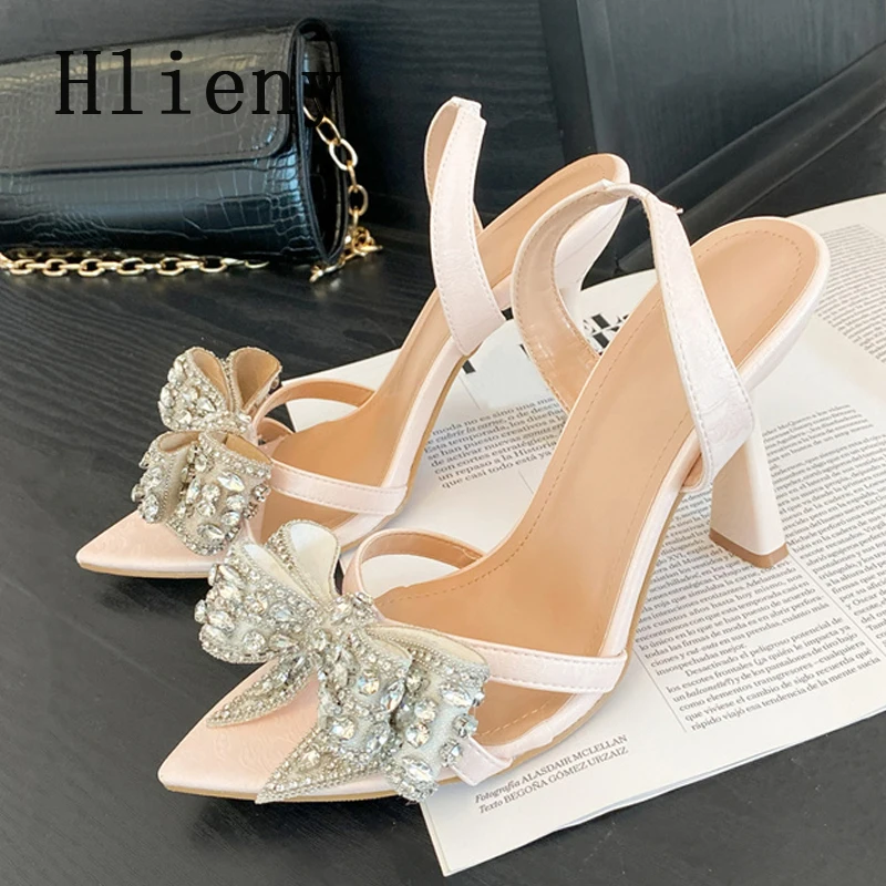 صنادل Hlieny Fashion مفتوحة من الأمام كريستالية بعقدة على شكل فراشة وحزام خلفي للنساء بكعب عالٍ رفيع أنيق للحفلات أحذية صيفية للسيدات
