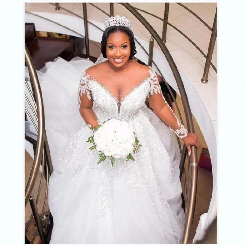 Abito da sposa personalizzato meraviglioso scollo rotondo con applicazioni di perline Robe De Mariage 2025 Plus Size maniche lunghe A-Line africano