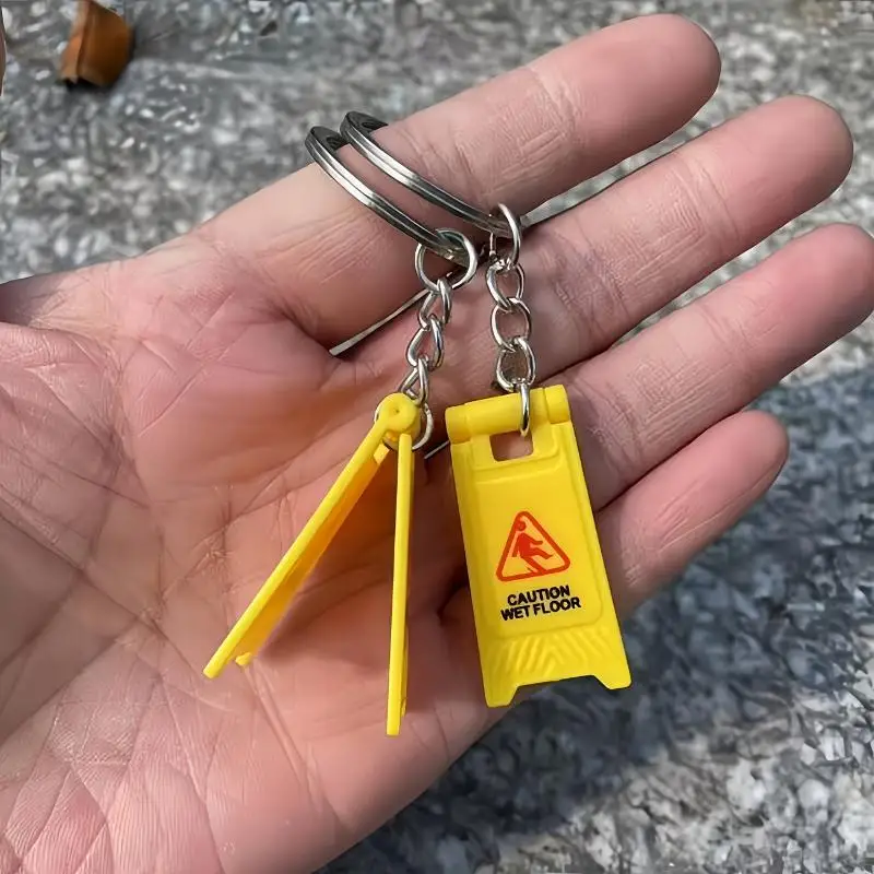 1/3 Stück "VORSICHT NASSER BODEN" Faltbares Warnschild Schlüsselanhänger Modischer Rucksackanhänger Autoschlüsselanhänger Partygeschenk – Detail 5