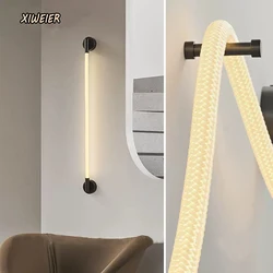 Modern and simple bedroom bedside lamp Nordic living room study fiber woven light emitting tube atmosphere modeling wall lamp