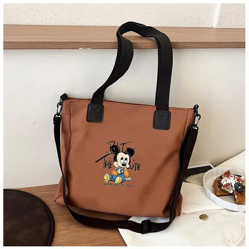 

Disney Mickey Mouse Cartoon Crossbody Shoulder Bag Minnie Mouse Canvas handbag Large Capacity Student Class messenger Tote Bag