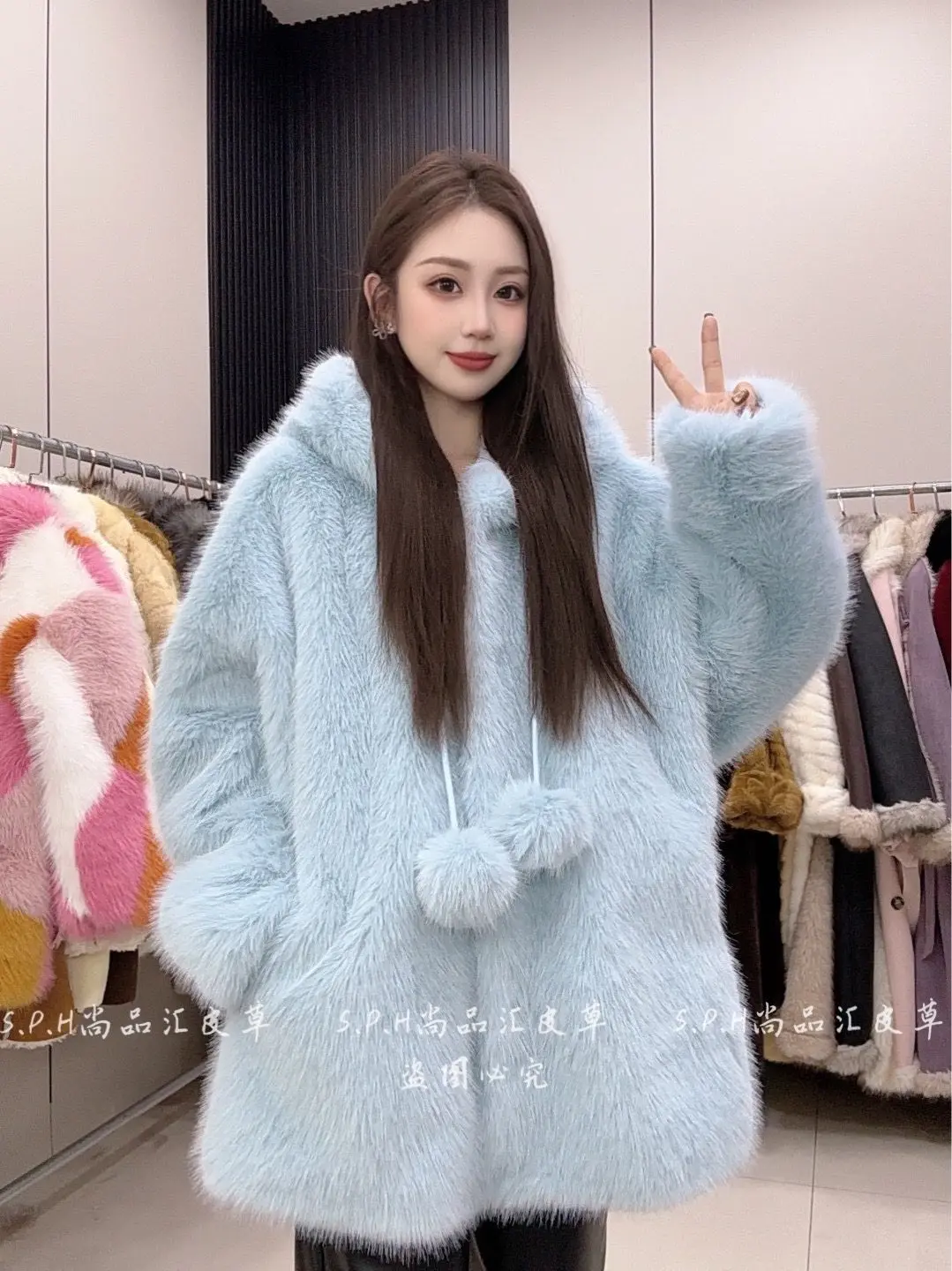 2025 Winter Nieuwe Capuchon Dikke Lange Bont Milieuvriendelijke Bontjas Vrouwen Losse Mode Zoete Pom-Pom Verdikte Warme pluizige Jassen