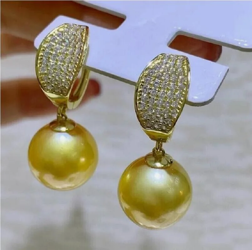 

Large quantity of AAAAA 11-10mm genuine natural round South China Sea gold pearl earrings 925s