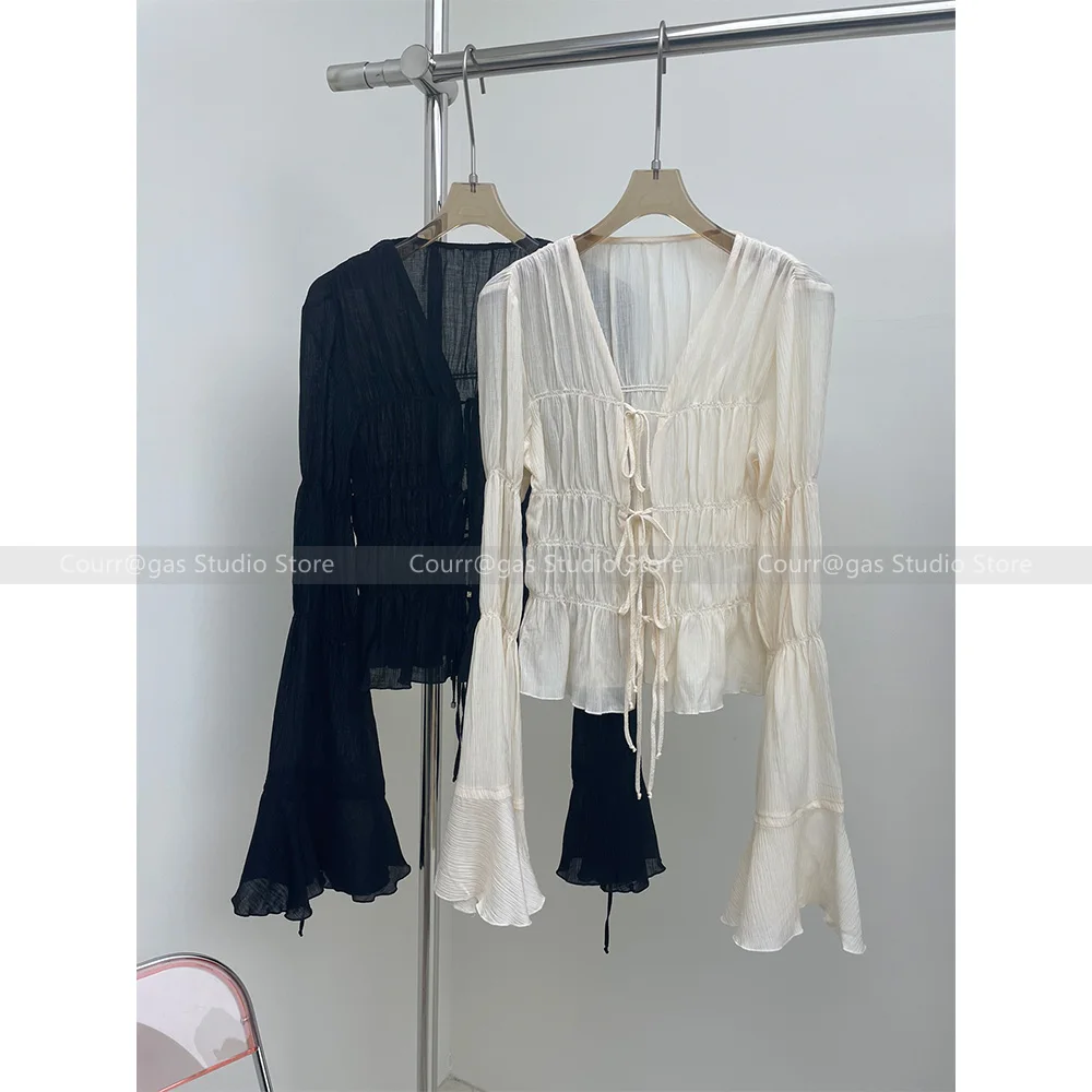 Temperament pleated textured top unique trumpet sleeves v-neck design lace-up hollow shirt