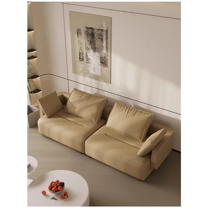 

Light luxury sofa, luxurious feeling, living room, household small unit, simple leather art sofa, cream style straight row sofa