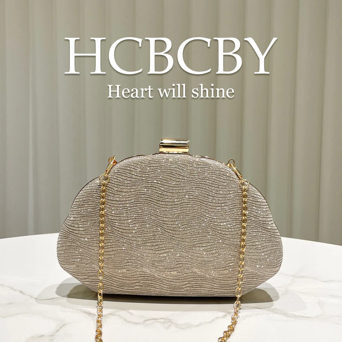 Gold shiny shell-shaped water ripple clutch bag, women's fashionable simple and elegant box-shaped dinner bag