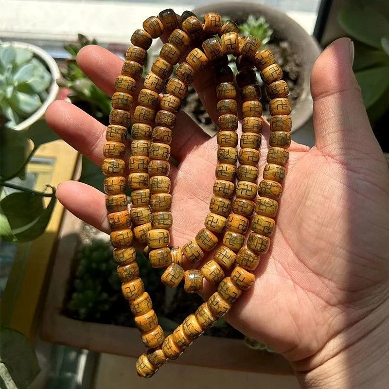 

Tibetan-style collectible item: Cow bone vintage patterned hand bracelet with tiger skin Buddha , 108 solid prayer beads, v