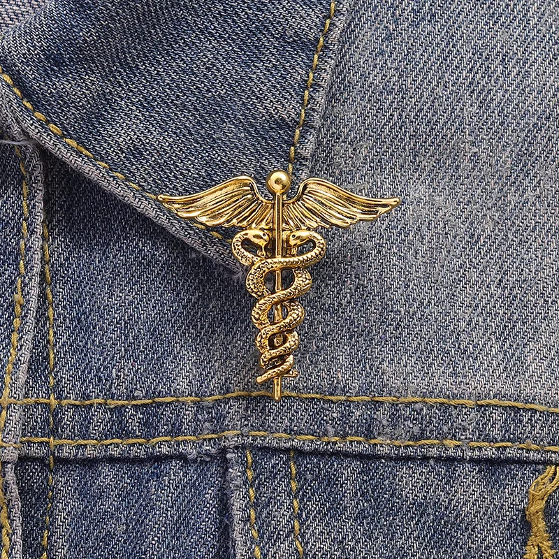 Alfileres esmaltados de caduceo médico Retro, símbolo de medicina, ala con broche de serpientes, insignia de solapa para mochila, regalo de joyería para médico y enfermera