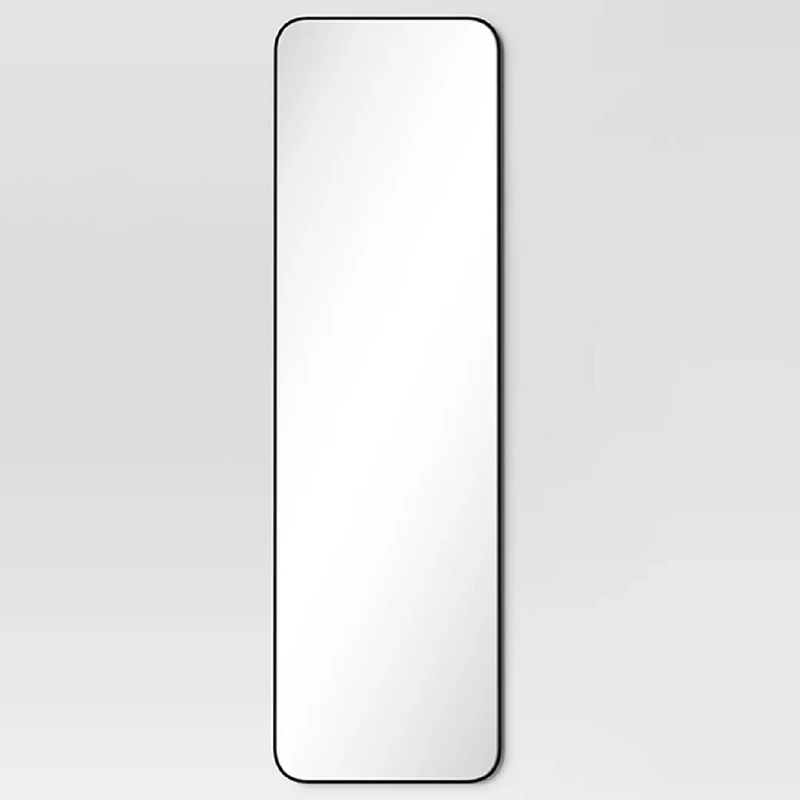 

A solid metal frame full-length mirror can be hung on a wall or a door