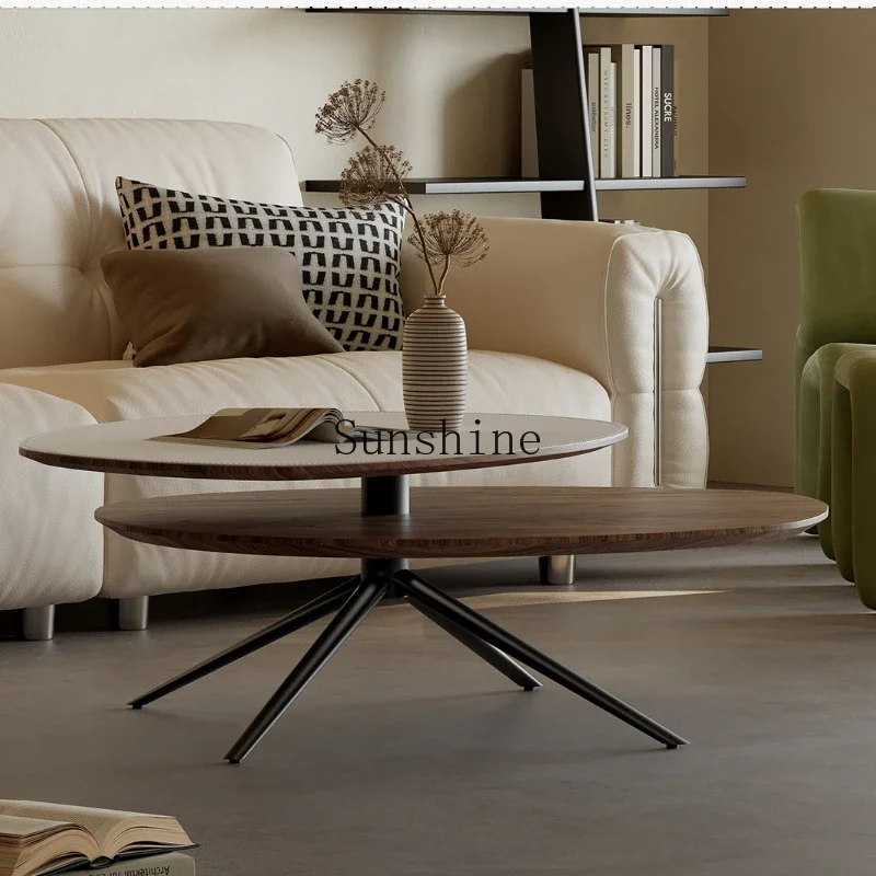 

Modern simple special-shaped saddle leather living room household stainless steel high-foot rotating coffee table