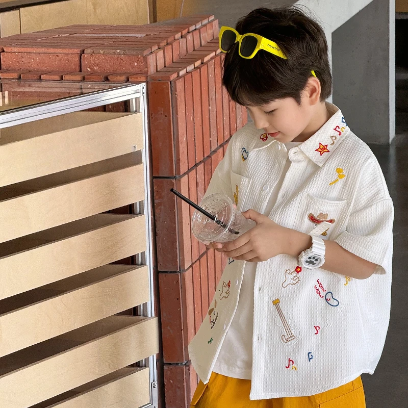 

2025 Children's Summer New Solid Color Pit Stripe Simple Drawing Cute Small Printed Short Sleeved T-shirt