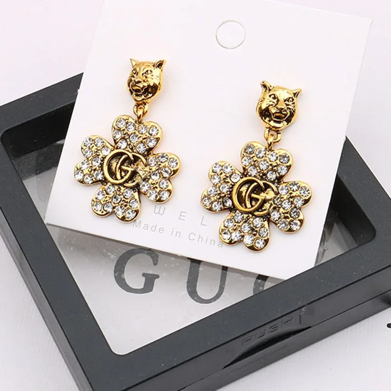 أقراط نسائية فاخرة على شكل زهرة برونزية عتيقة 2025 أقراط رأس GG جديدة مجوهرات نسائية هدية للحفلات