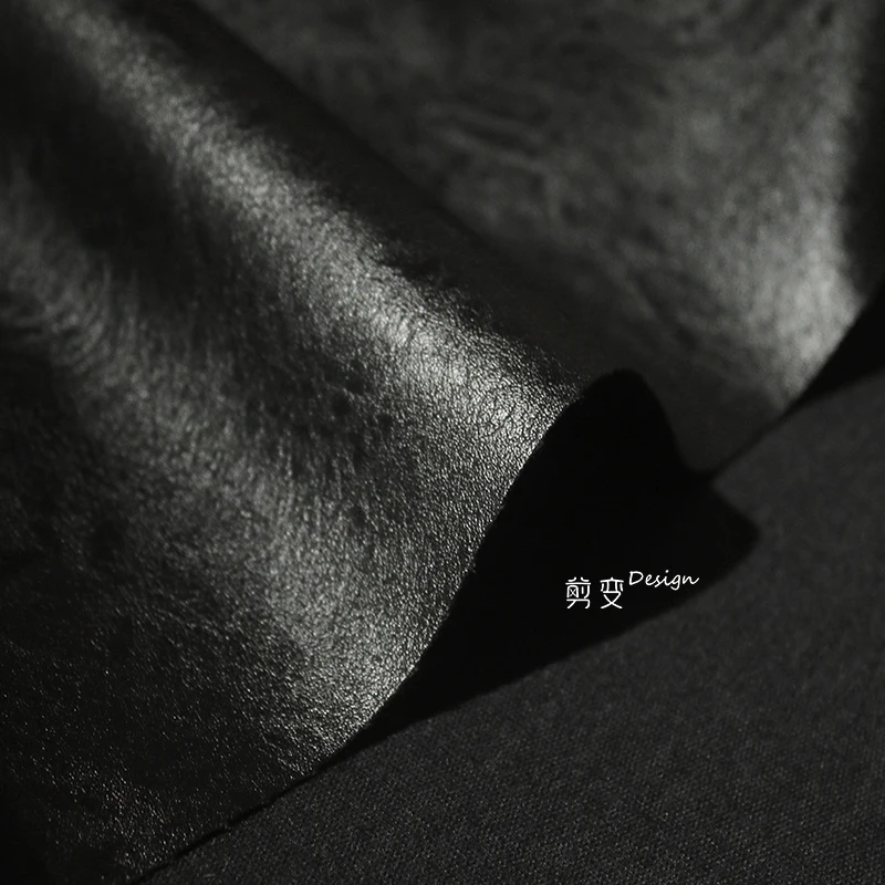 Angola black matte coarse texture artificial environmentally friendly leather pu designer fabric high-end coat clothing fabric