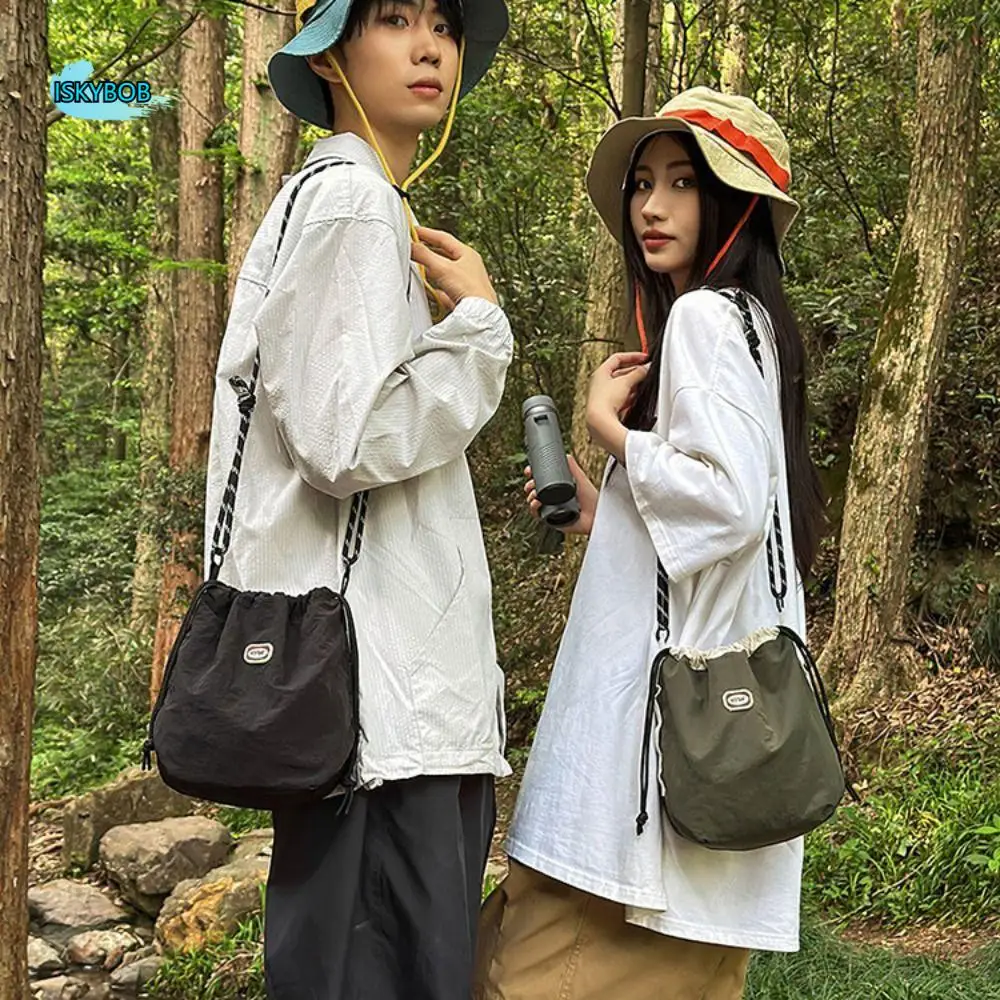 

Portable Sports Nylon Shoulder Bag Coin Pouch Solid Color Drawstring Crossbody Bag Casual Korean Style Mobile Phone Pack Travel