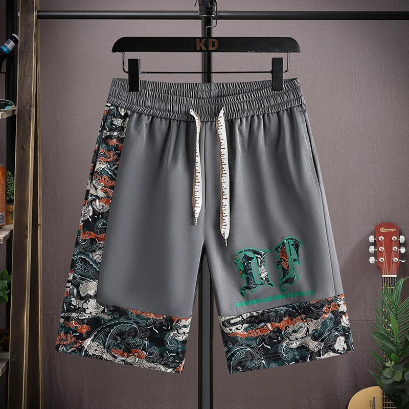 Pantalones cortos de verano para hombre, pantalón informal de cintura elástica hasta la rodilla, a la moda, para correr, prendas de chándal finas, novedad de 2023