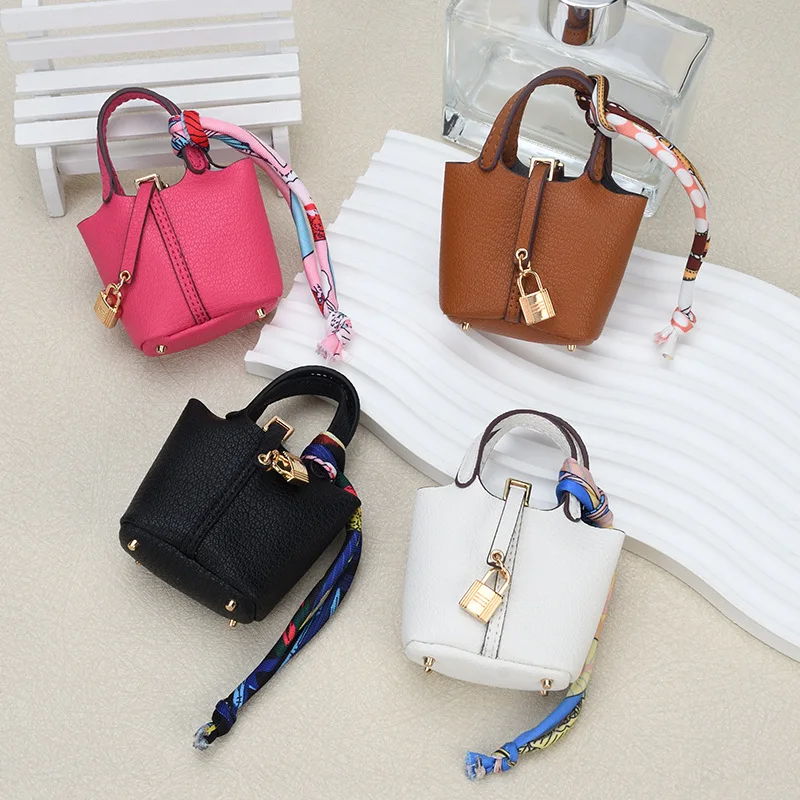 Mini borsa pendente per interni auto decorazione specchietto retrovisore borsa per cuffie in pelle di fascia alta portamonete portachiavi multifunzionale