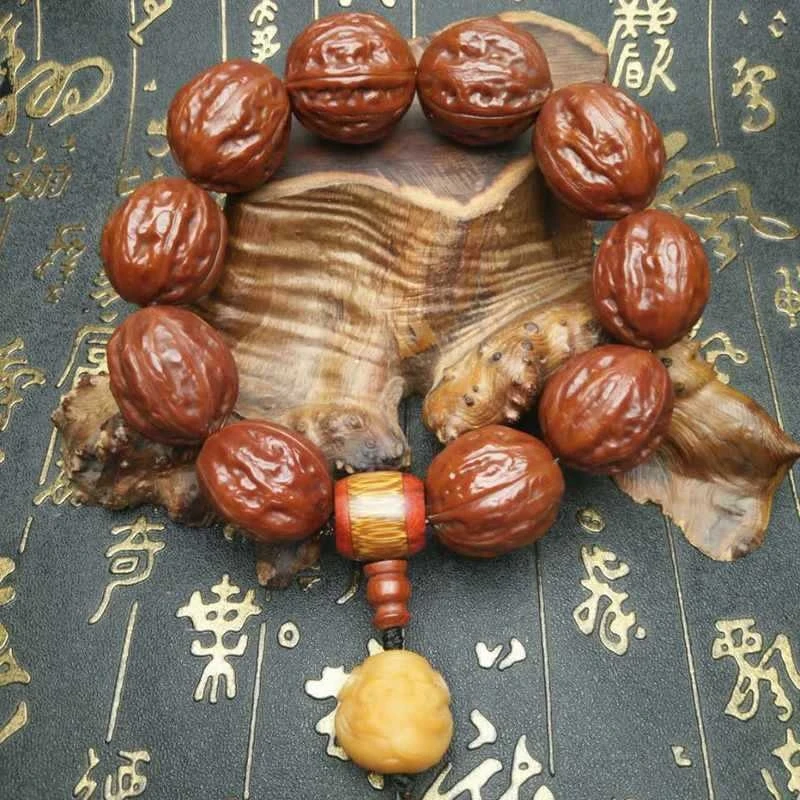 -Polished, Patinaed, Jade-Like , Small , Hand-Held Walnut Bracelet