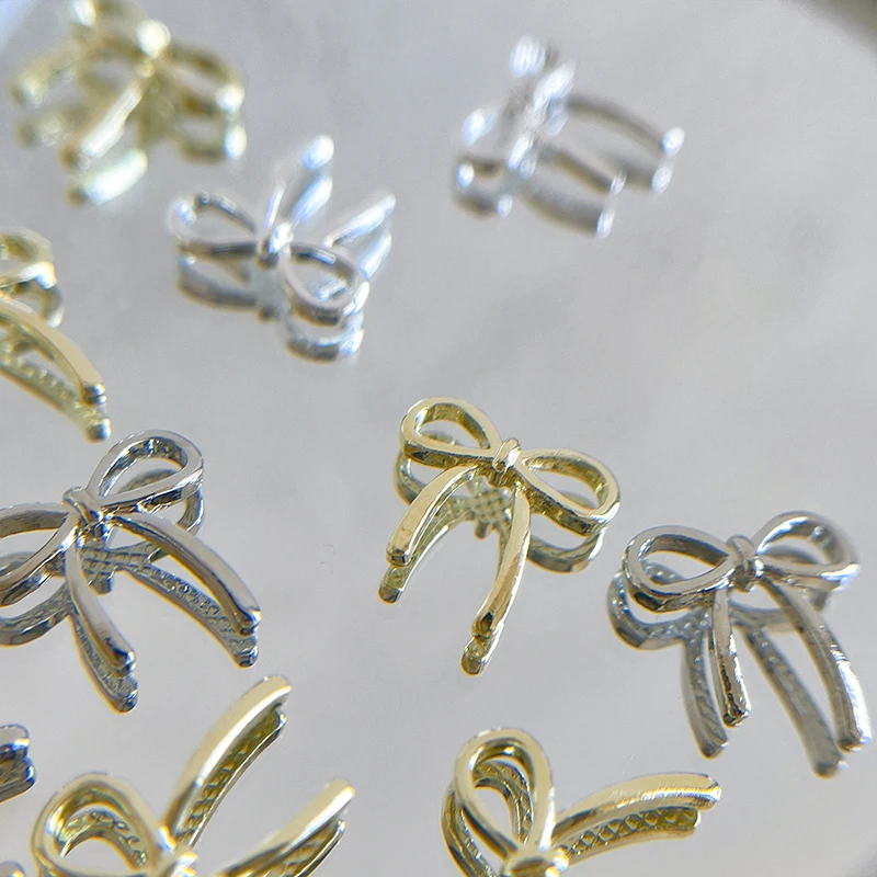 10 sztuk kokarda Deco Nail Art Charm 3D srebrna/złota kokardka wstążka części do dekoracji paznokci DIY luksusowe akcesoria do Manicure