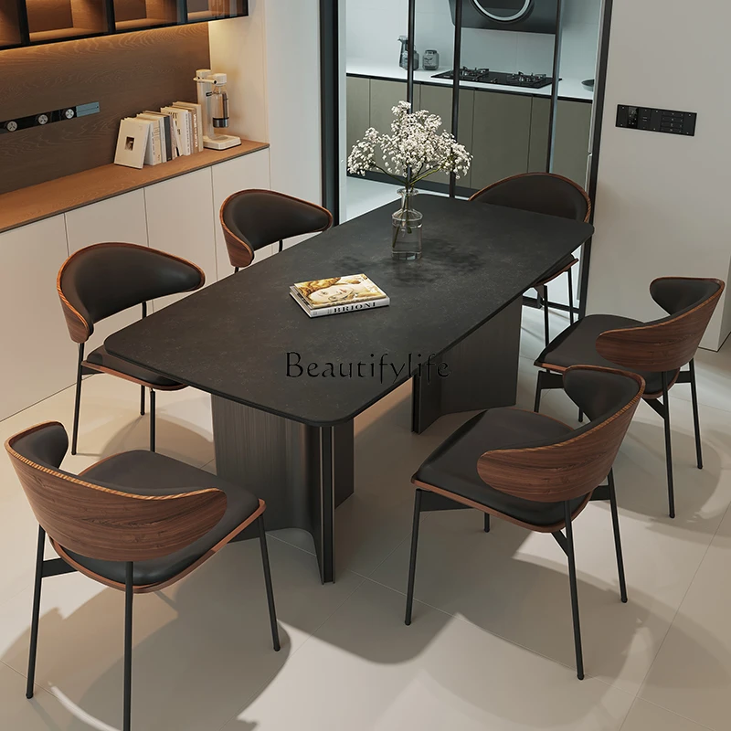 

Simple modern black rock slab dining table rectangular retro small apartment wabi sandy wind