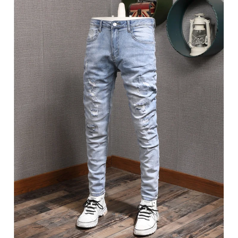 

Light colored casual jeans for men, slim fit with small feet and elastic Korean style trendy and versatile casual ripped pants