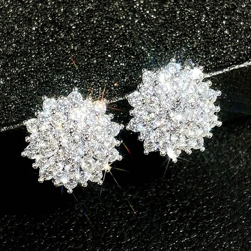 Huitan-pendientes de tuerca con forma de flor para mujer, joyería de moda para fiesta, compromiso diario, CZ brillante con incrustaciones, accesorios versátiles para boda