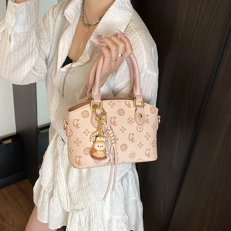 

2025 new embossed small niche pendant small niche high sense large capacity women's bag handbag shoulder bag crossbody bag