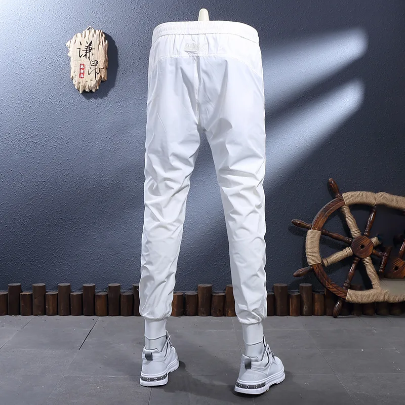 2025 Summer Thin Men's Quick Drying Pants White Breathable Elastic Slim Fit Leg Tight Casual Sports Pants