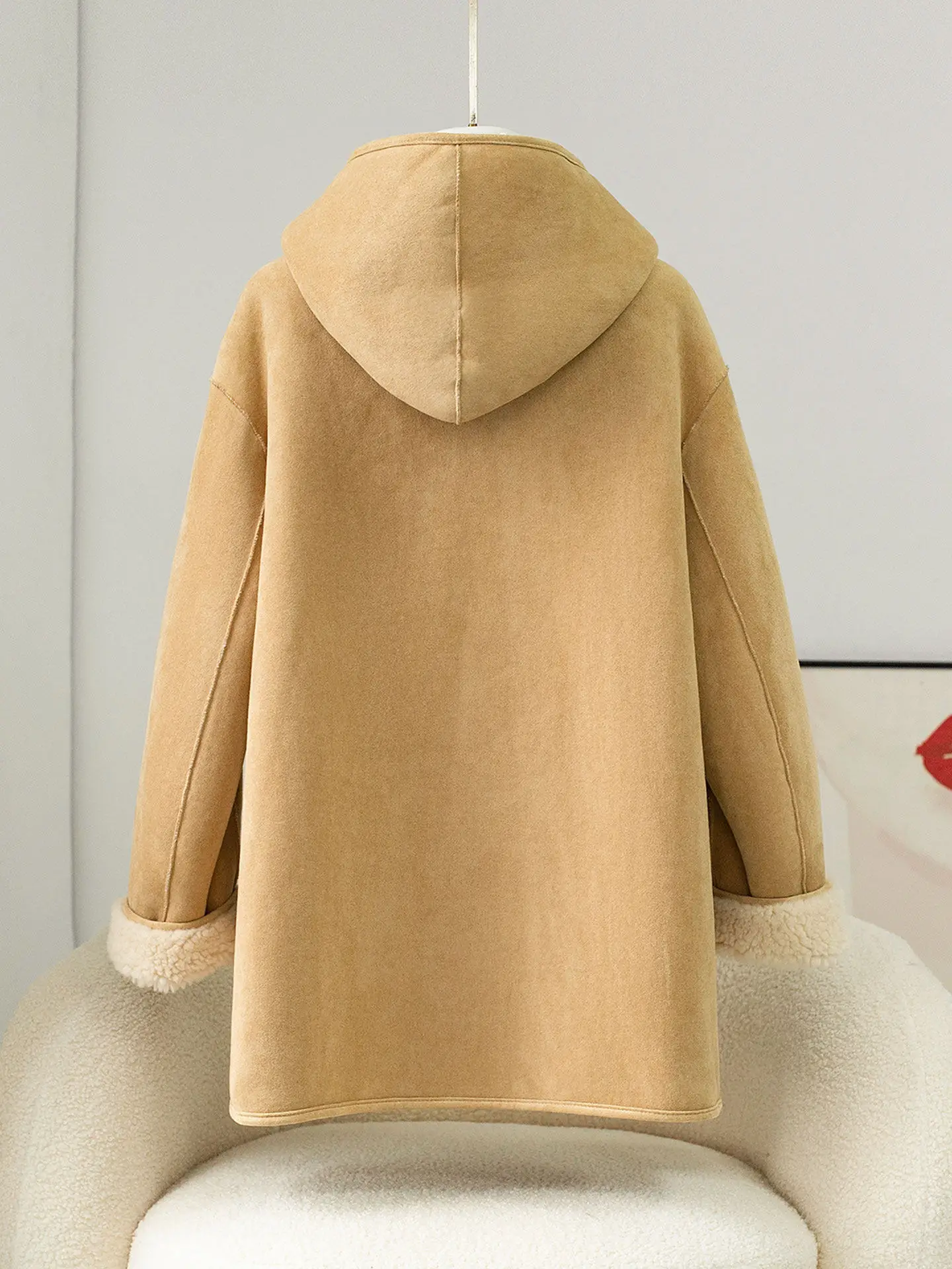 Wear a 100-wool, suede, velvet and fur hooded jacket on both sides and a lambskin fur coat for warmth in winter